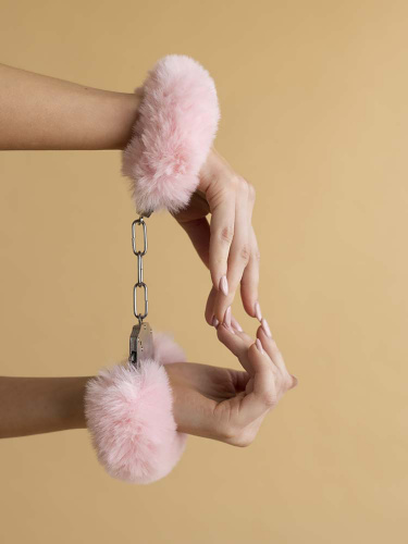 Chic handcuffs with fluffy pastel pink fur